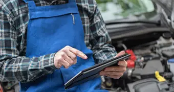 Professional checking the check engine light